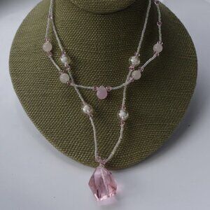 Women`s pink and clear beaded necklace. 14 inches.